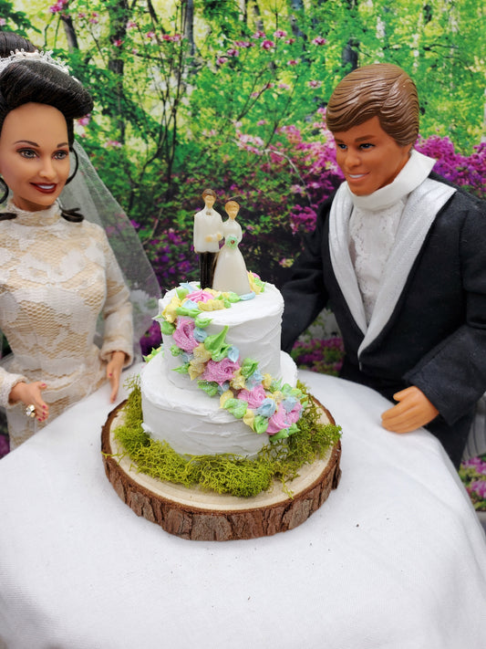 Barbir and ken with side swoop wedding cake