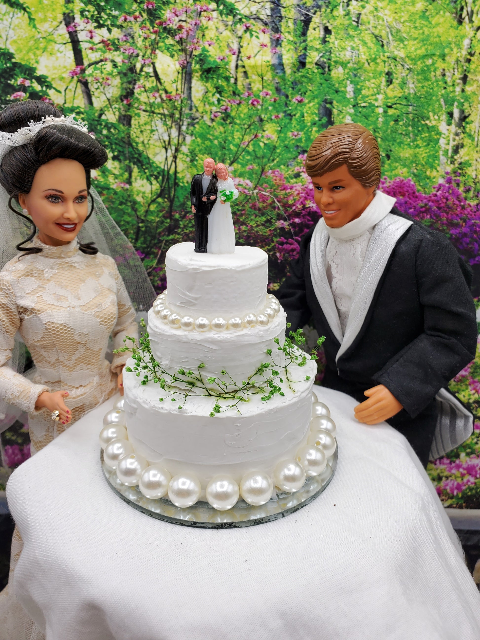 Barbie and ken with 3 layered wedding cake