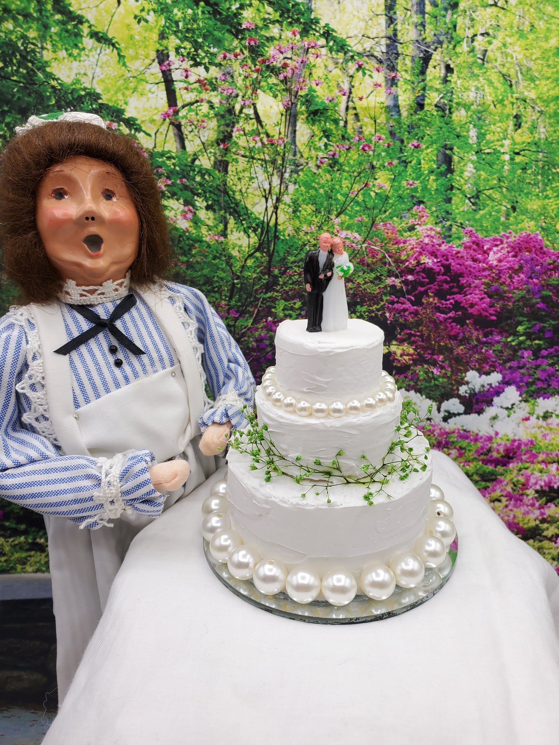 Byers choice doll with pearl wedding cake