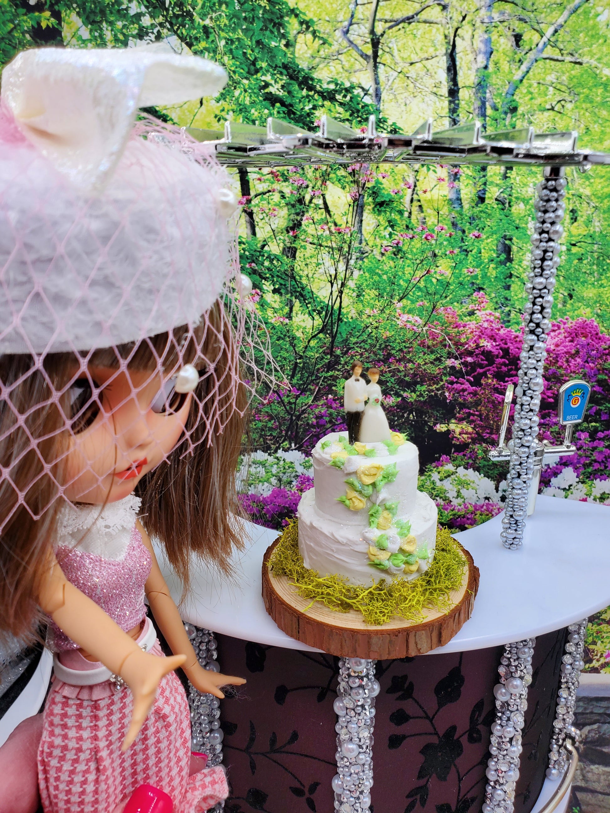 Blythe with a wedding cake