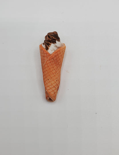 Chocolate sauce ice cream cone