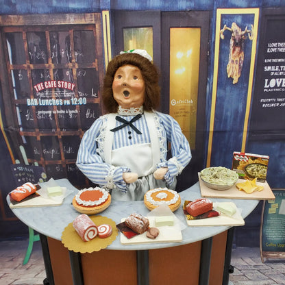 Byers choice doll with pumpkin roll