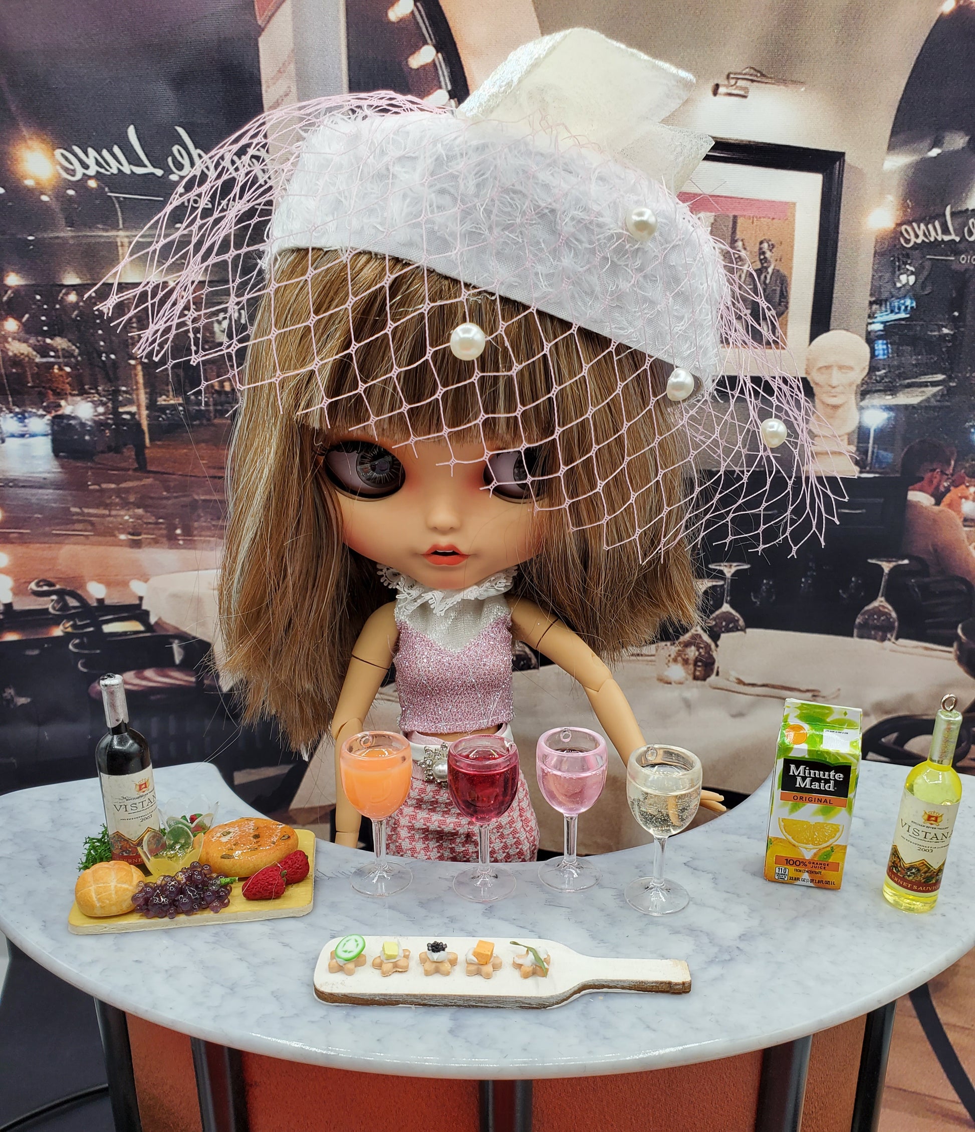 blythe doll with wine and cheese board